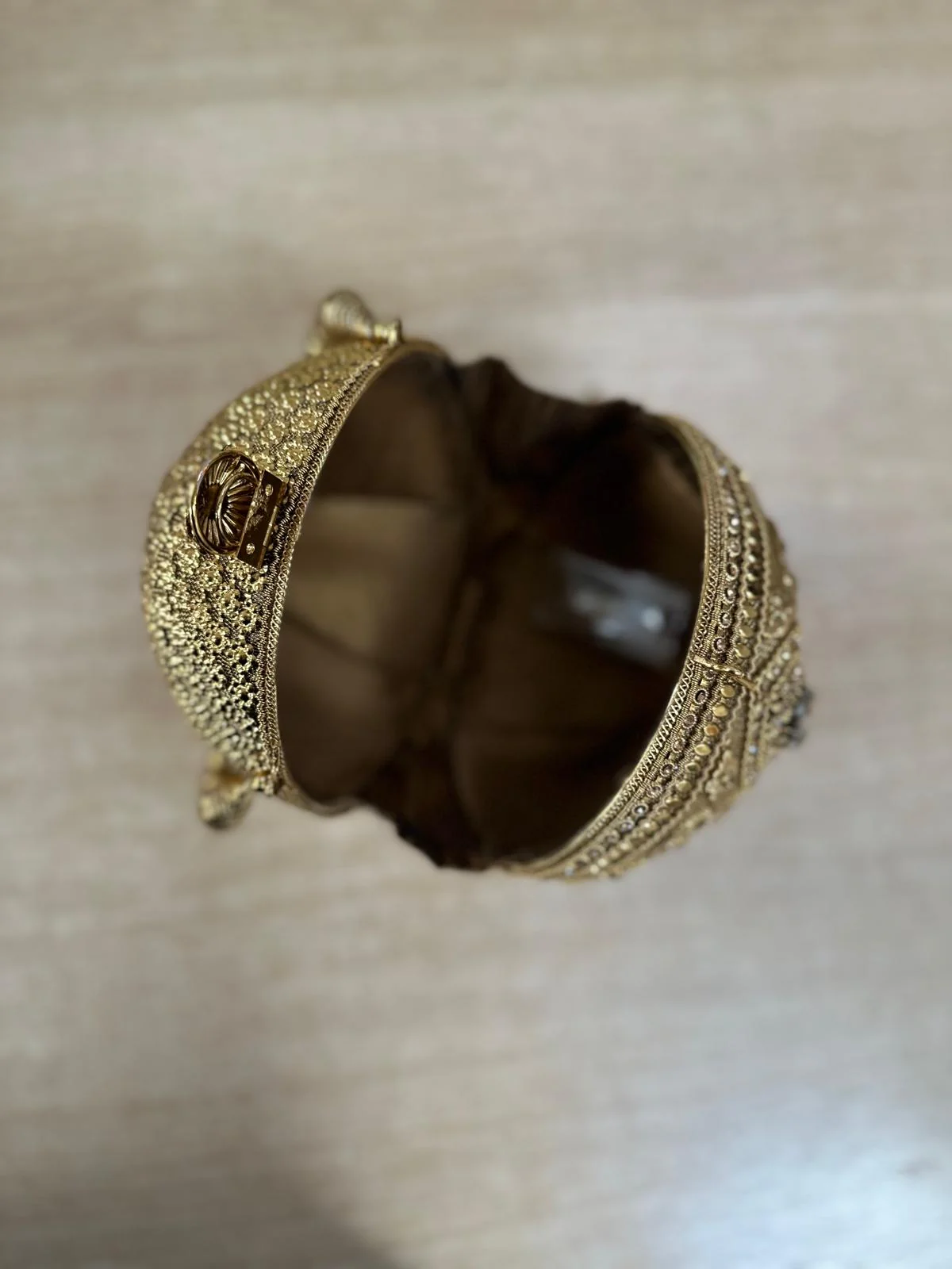 Round Metallic Carved Potli Bag - Image 2