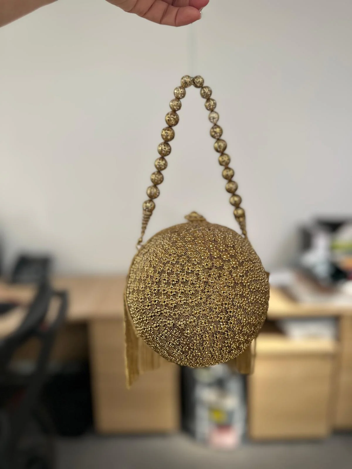 Round Metallic Carved Potli Bag - Image 3