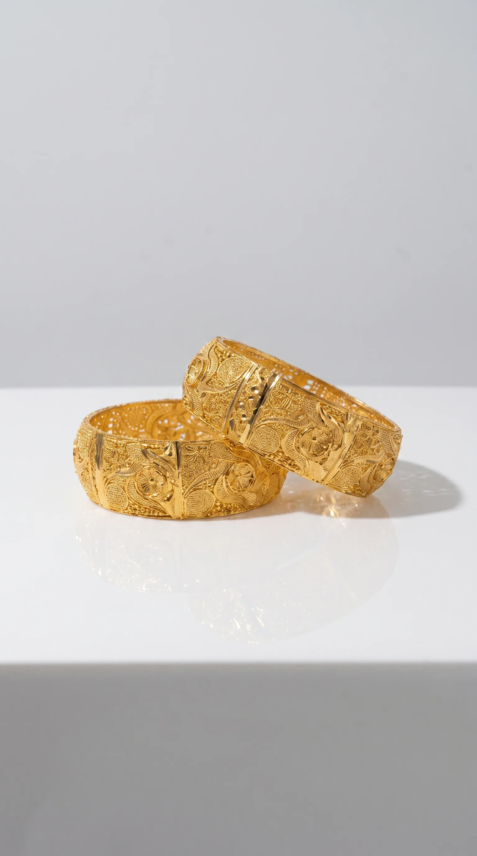 Thick 2pc kara with engraved gold design. - Image 2